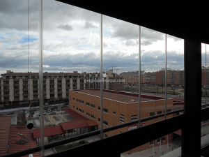 cerramiento acristalado exterior en edifiio de Madrid